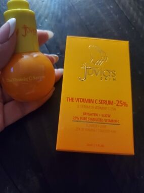 Juvia's Place Vitamin C Serum Bottle and Box in Bright Orange and Yellow